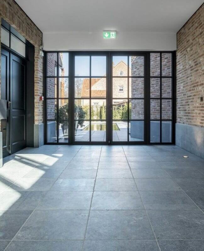 Blaustein-natursteinwolf-1-717x1024 (1) | aestivate Belgischer Blaustein Eingang aestivate